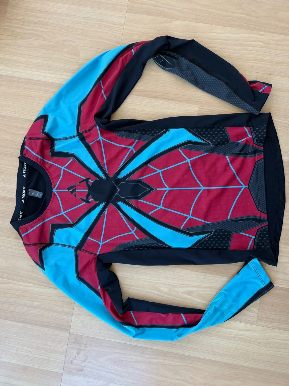 Adidas Techfit Spider-Man long sleeve top with red, black, and light blue Spider
